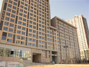 Sweetome Vacation Rentals Pollex Plaza Qingdao Buitenkant foto